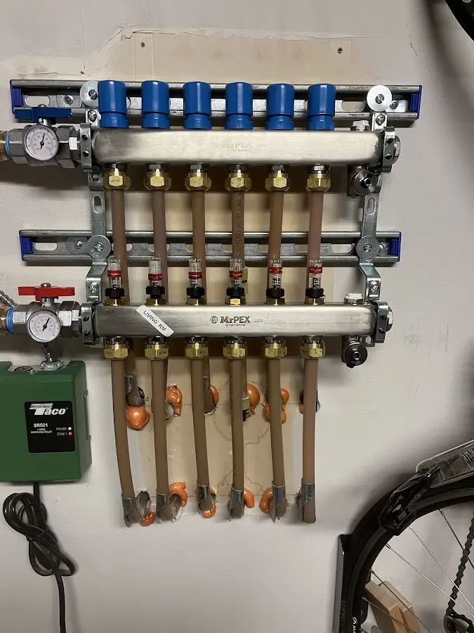 Plumber performing Water Heater Repair at a residential property in Sturgis